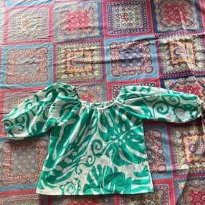 Manuheali’i turquoise blue with white size medium.